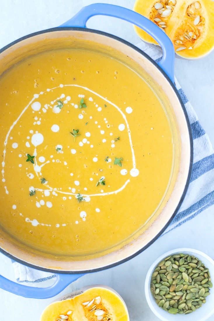 Roasted Autumn Squash Soup is my favorite easy Whole30 and Paleo Butternut Squash Soup recipe. This easy squash soup has a blend of butternut squash, sweet potato, apple and onion that sets it apart from the usual butternut squash soup. #butternutsquash #dairyfree #whole30 #paleo #paleosoup 