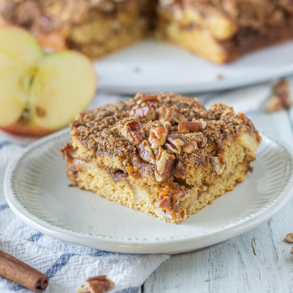 Paleo Apple Cinnamon Coffee cake is an easy brunch recipe or gluten free dessert. This refined sugar free apple coffee cake is a great healthy fall recipe that will impress any guests. #paleo #norefinedsugar #applecinnamon #glutenfreedessert #dairyfree #healthydessert #brunchrecipe 