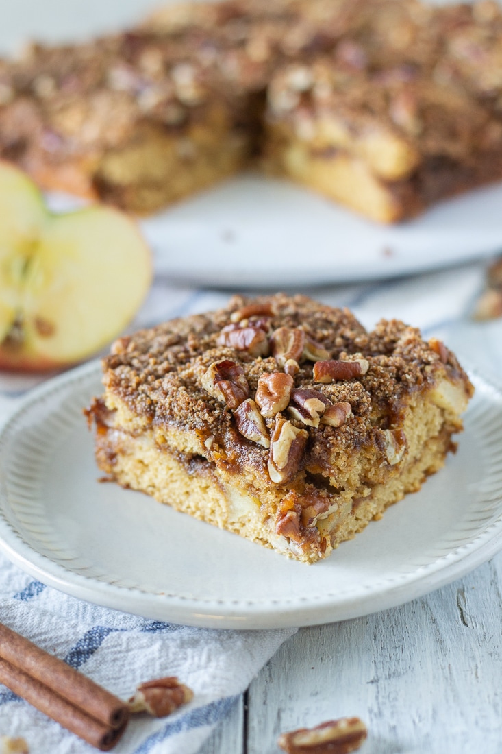 Paleo Apple Cinnamon Coffee cake is an easy brunch recipe or gluten free dessert. This refined sugar free apple coffee cake is a great healthy fall recipe that will impress any guests. #paleo #norefinedsugar #applecinnamon #glutenfreedessert #dairyfree #healthydessert #brunchrecipe 