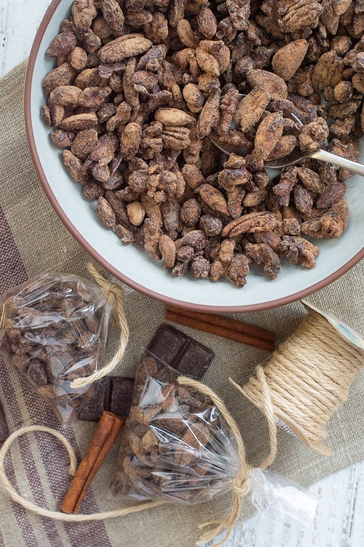 Dark Chocolate Instant Pot Glazed Nuts are great for holiday gifts or hostess gifts. These are paleo, low carb, refined sugar free and gluten free. A great, inexpensive healthy chocolate nut treat! #glutenfree #darkchocolate #holidaygift #holidayfood #hostessgift
