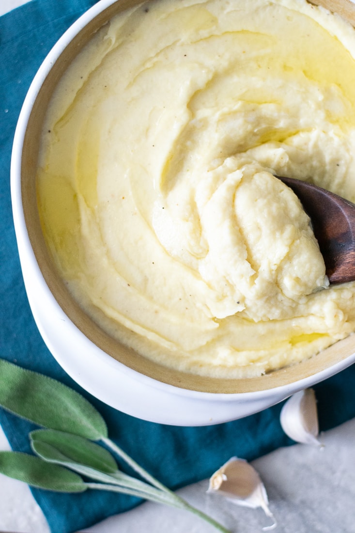 Garlic and sage whipped parsnips are a creamy and healthy side for all your favorite chicken and steak recipes. This dairy free parsnip puree recipe is paleo and whole30 approved!