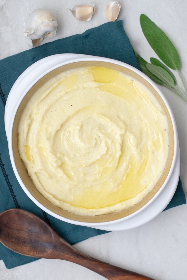 Garlic and sage whipped parsnips are a creamy and healthy side for all your favorite chicken and steak recipes. This dairy free parsnip puree recipe is paleo and whole30 approved!