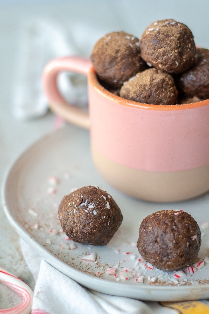 Peppermint Mocha Protein Balls are sweetened with dates and cocoa powder and protein boosted with collagen peptides. A quick on-the-go, healthy, no bake snack that is Paleo, Whole30, Gluten Free and Dairy Free.