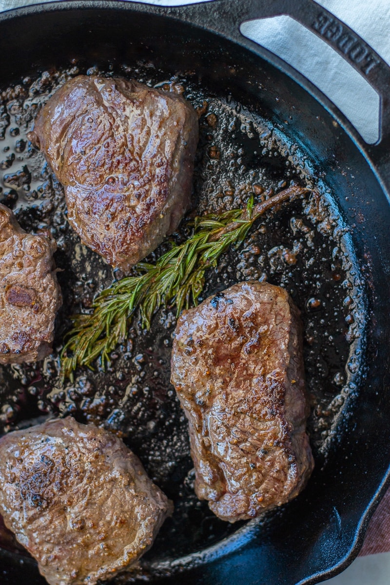 Simple cast iron steak is both keto, paleo and whole30. Learn how to cook sirloin steak on the stovetop. It's the perfect meal prep recipe. #keto #paleo #whole30