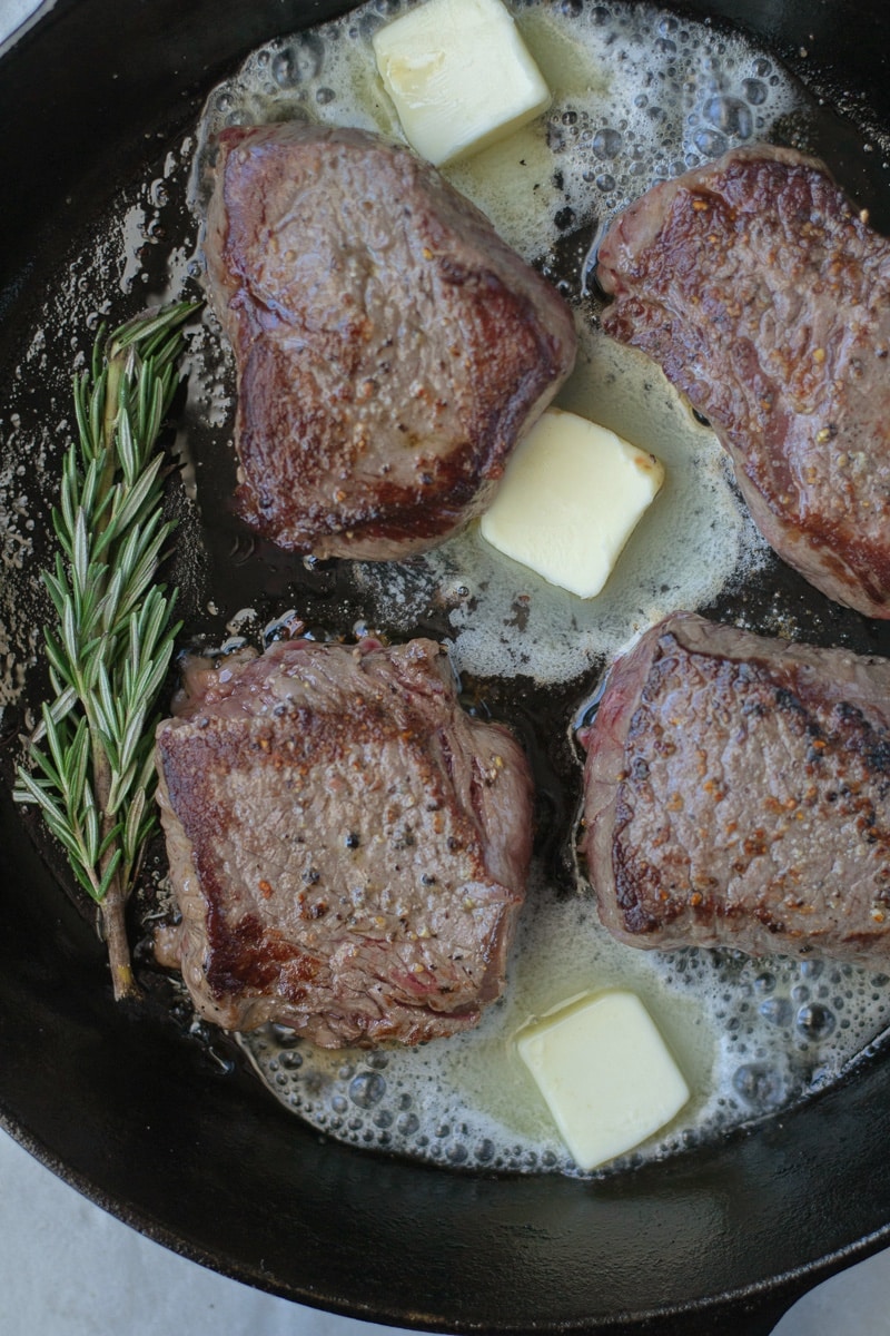 https://fixedonfresh.com/wp-content/uploads/2019/12/MELT-BUTTER-IN-THE-SKILLET-WITH-STEAK.jpg