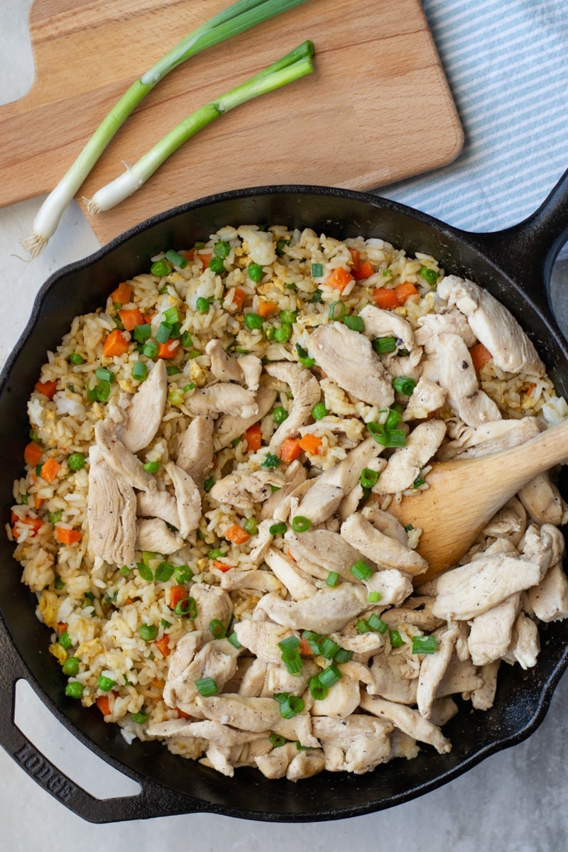 Homemade, better than takeout Chicken Fried Rice is healthier, soy free and awesome for meal prep. These best part is this simple and delicious recipe only takes 20 minutes to make!