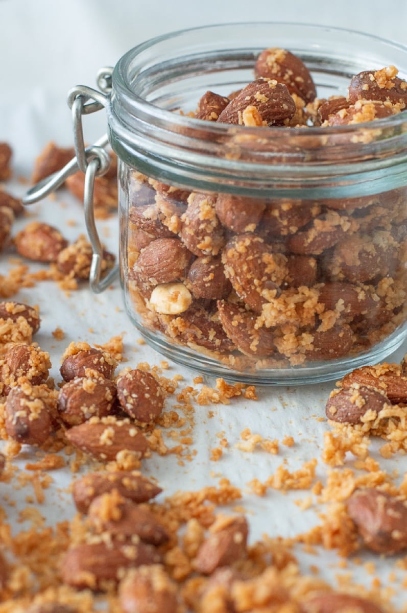 Coconut Roasted Almonds - a delicious Paleo snack that is honey sweetened and easy to make ahead for healthy snacks all week! Serve over yogurt or fruit. 