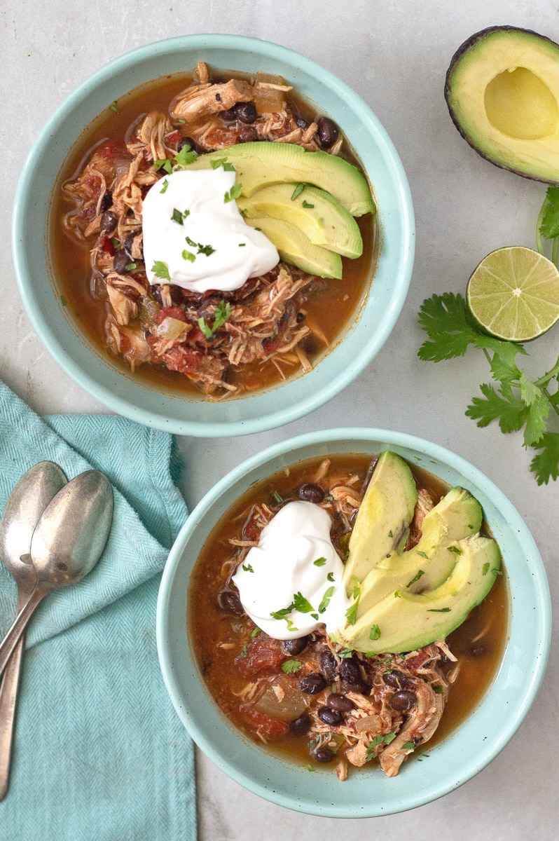 Crockpot Southwest Chicken Soup is a healthy weeknight meal that you can set and forget in the morning and enjoy in the evening. Salsa, veggies, chicken, beans and southwest seasoning make this slow cooker soup delicious and nutritious. #slowcooker #healthy #soup