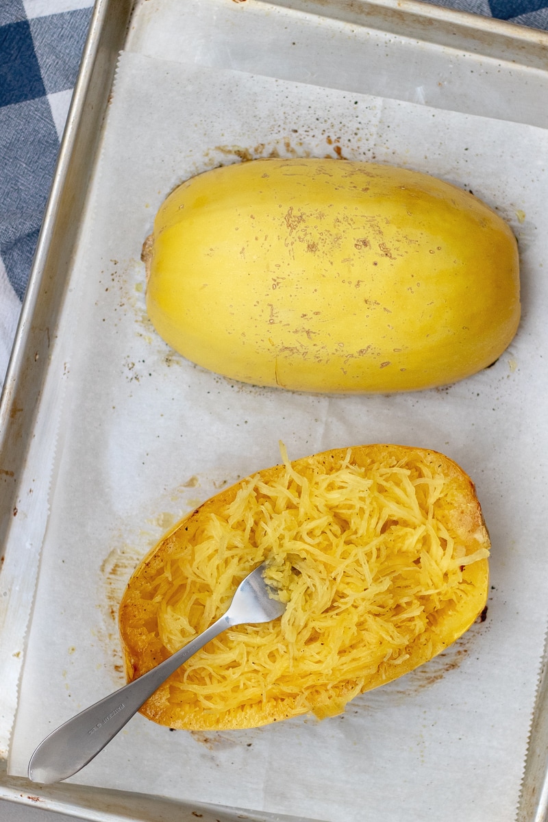 Learn how to cook spaghetti squash in the oven, how many carbs are in this low carb veggie noodle, and tips for how to easily cut it. 