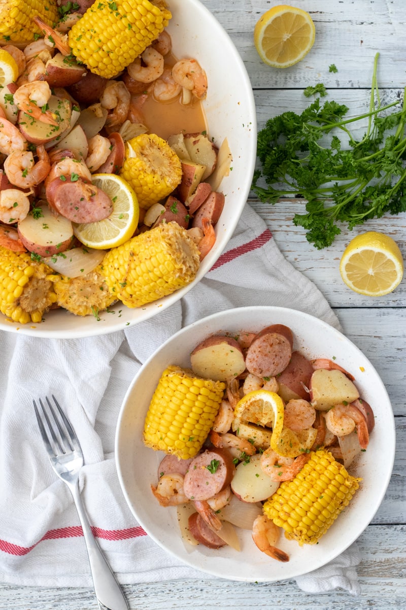Easy one pot meal, Low Country Shrimp Boil is filled with shirmp, sausage, corn, and potatoes and boiled in Old Bay Seasoning and other aromatics to make a simple and delicious weeknight meal. 
